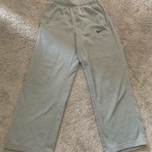 Light grey Nike sweatpants.